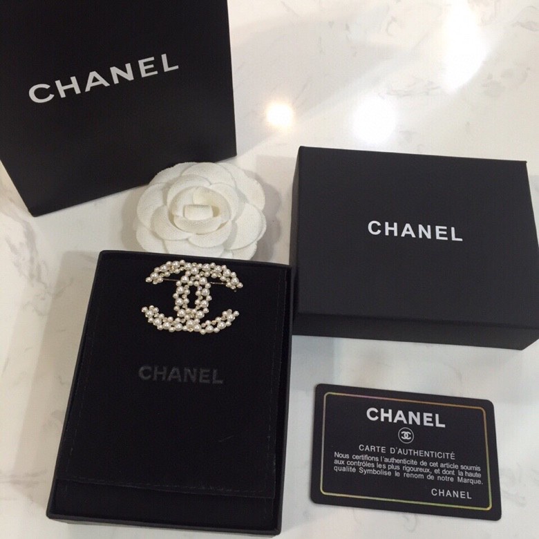 Ch*el brooches